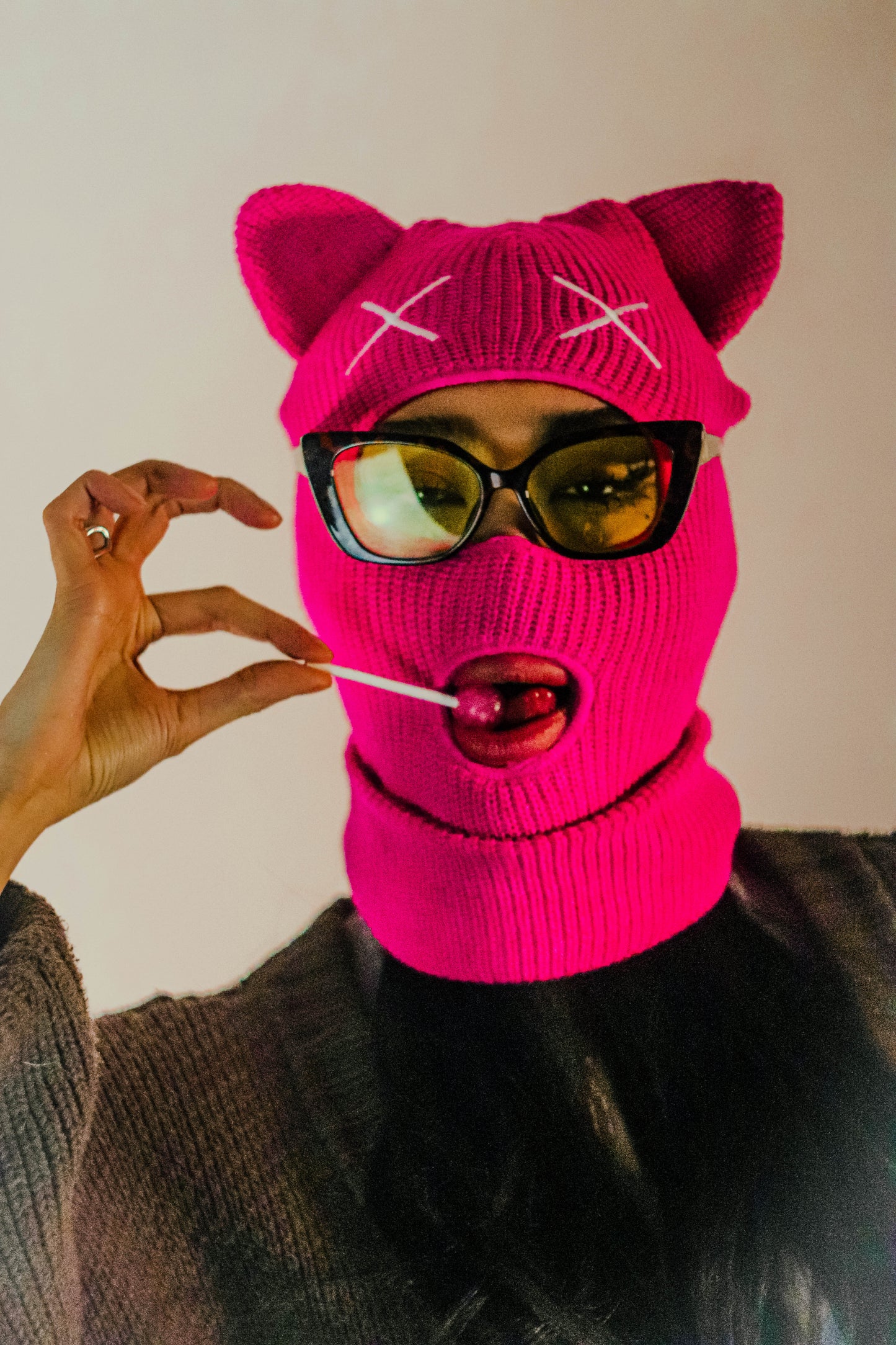 Pink knitted balaclava with cat ears