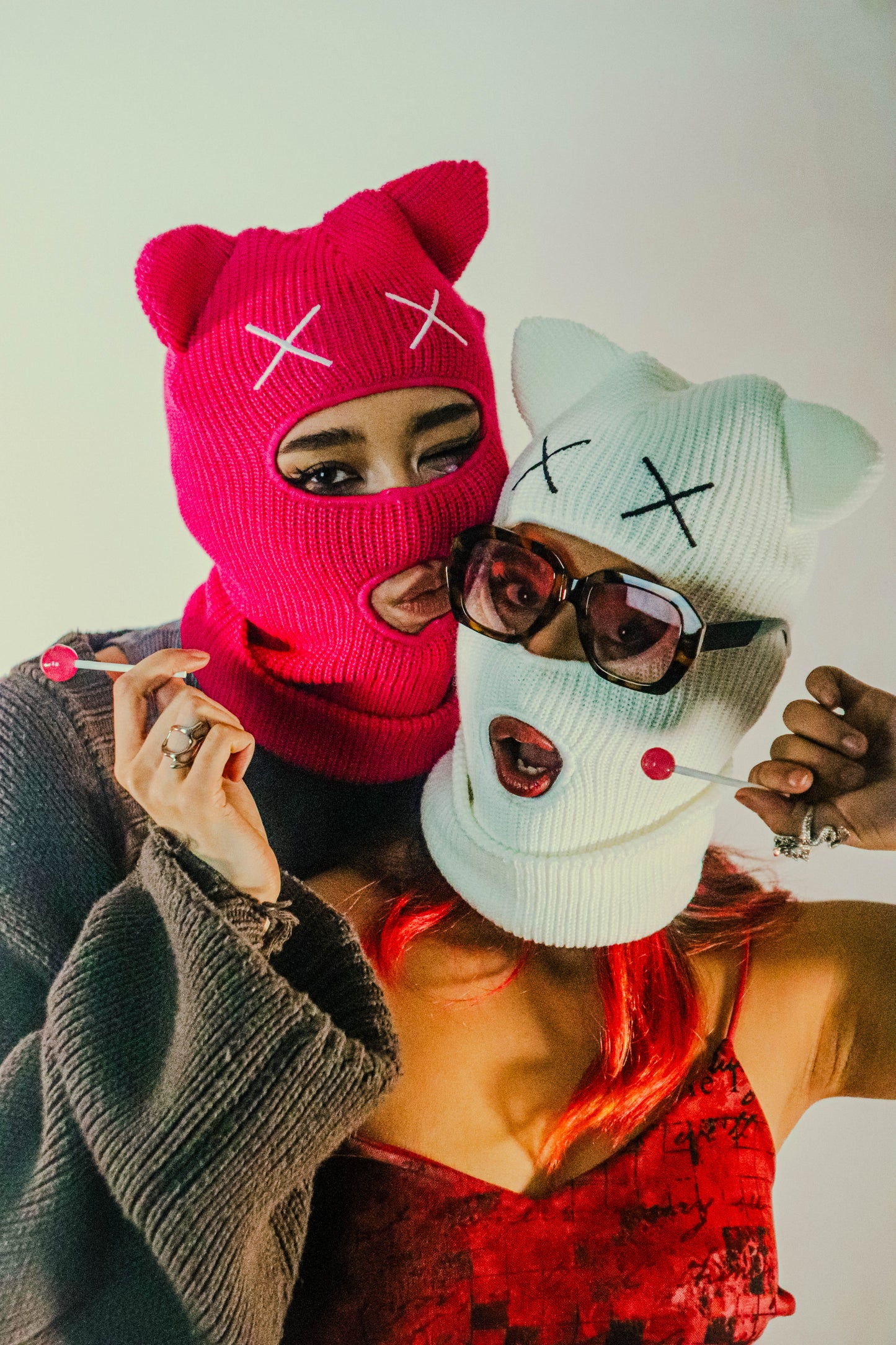 Pink knitted balaclava with cat ears