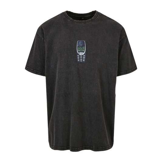 Front view of a stonewashed black oversized fit short-sleeve T-shirt featuring a Nokia 3310 graphic printed across the chest.